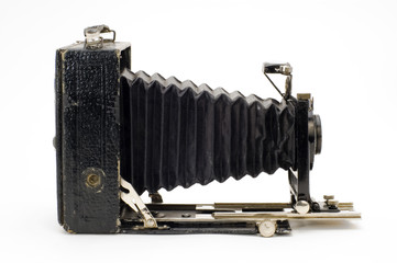 Old classical camera with furs.