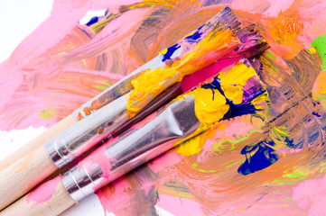Fototapeta premium Brushes with paints