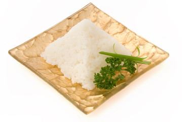 gold plate of coocked rice on white