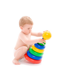 Baby play with tower from colorful discs