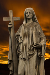 Fototapeta premium Religious statue at dusk.