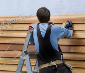 Applying cedar siding