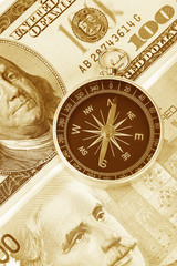 Fototapeta na wymiar Compass and dollar