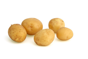 Fresh potatoes with skin, isolated on white background
