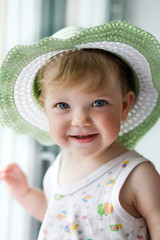 Baby-girl in a hat
