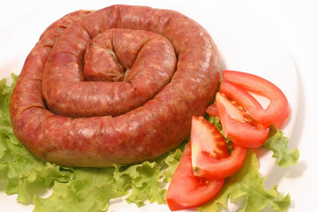 domestic made sausage served with vegetables