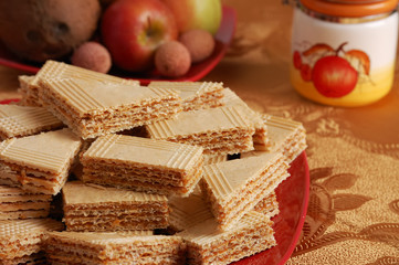 Sweet caramel waffle with decoration on the table
