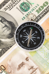 Compass and dollar