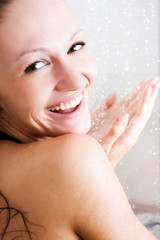 Happy woman in shower