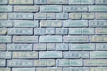 banknotes painted brick wall