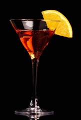  Orange cocktail on black background