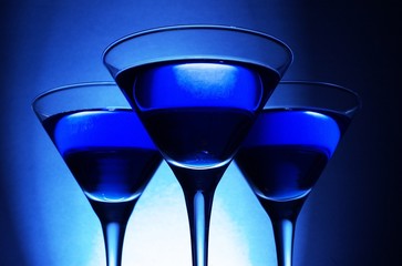 Three blue cocktails close up