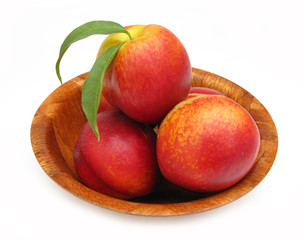 Nectarines perfect in wooden dish 