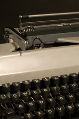 Vintage typewriter on black background