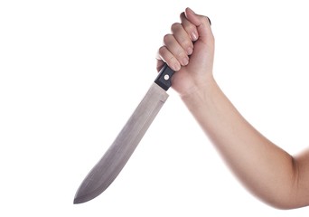 Big kitchen knife in female hand. Isolated on white.