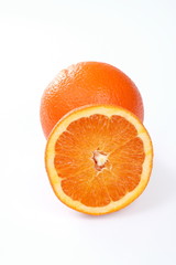 One and half fresh oranges isolated on white