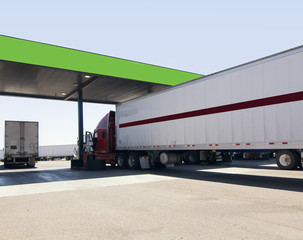 Obraz na płótnie Canvas Truck at fuel stop off highway.