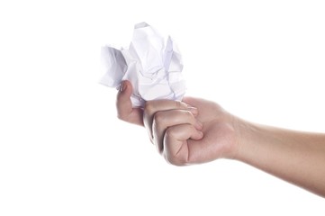 Crumpled paper in hand isolated on white.