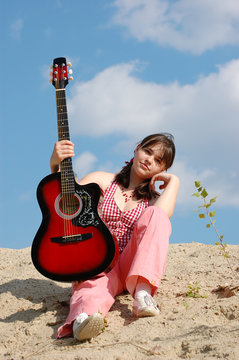girl with red guitar