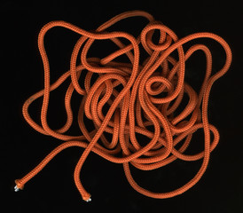 loose coils of orange, nylon cord