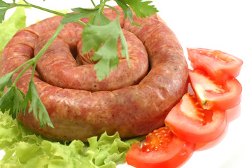 home made sausage on lettuce and parsley