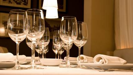 wine glasses set at reataurant table
