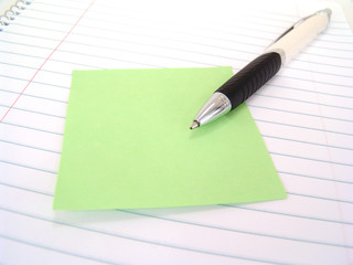 sticky note with pen