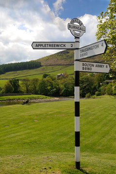 Old road sign in Burnsall, Yorkshire Dales National Park
