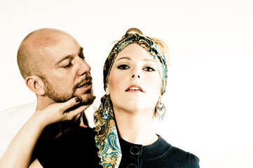 A young couple, photographed in the studio.