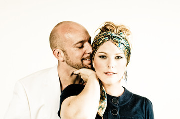 A young couple, photographed in the studio.