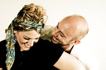 A young couple, photographed in the studio.