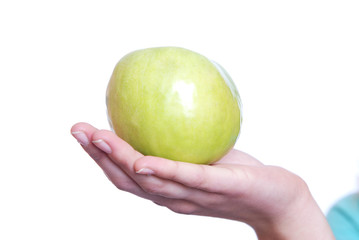 Apple on a hand