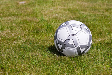 Plakat Soccer ball on the grass