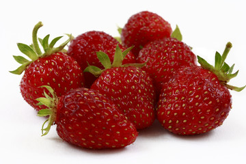 Ripe red strawberry on a white background