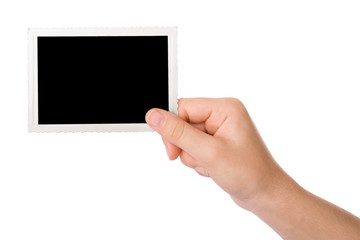 Hand holding a photograph isolated on a white background - obrazy, fototapety, plakaty