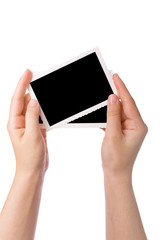 Hands holding a photograph isolated on a white background
