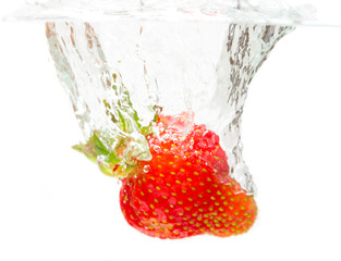 splashing strawberry