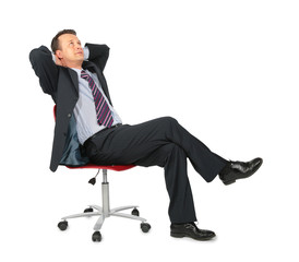 dreaming businessman sits on office chair