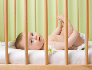 Baby girl in a crib