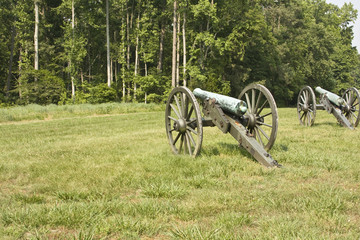 Civil war cannons on battlefield