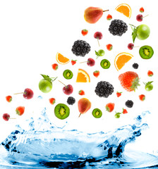 berry and fruit falling in juice. Isolation