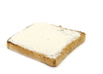 toast with butter isolated on white background