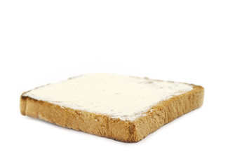 toast with butter isolated on white background