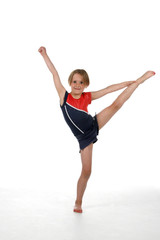 young girl balancing on one leg