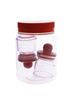 Mini empty condiment containers inside plastic jar
