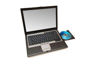 Laptop and cd-drive isolated on the white