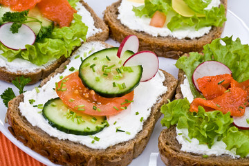 Whole grain bread, vegetables ,white cheese and salmon