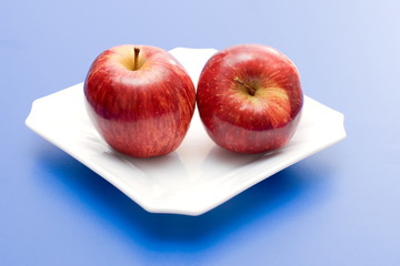 Apples in white plate