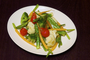 Asparagus and cauliflower with the tomatoes and the carrot