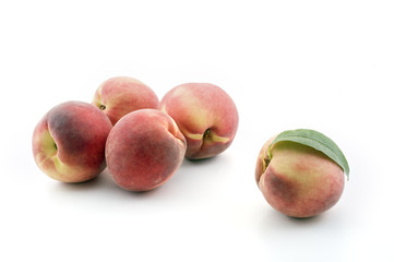 group of peaches isolated on white